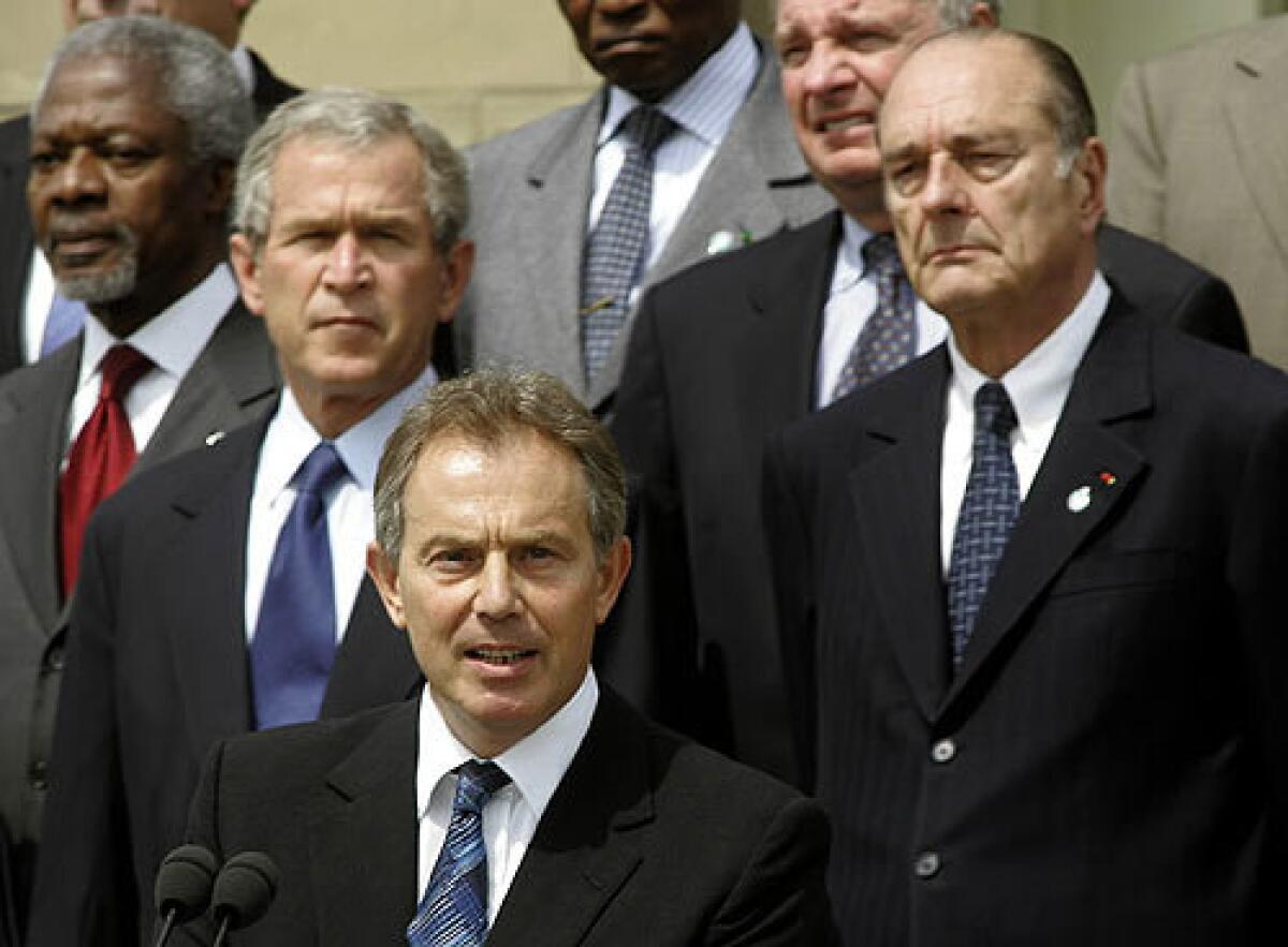 Shaken G-8 leaders agree on aid, climate British Prime Minister Tony Blair, front, gives a statement as G-8 and African leaders stand behind him at the conclusion of the summit July 8 in Gleneagles, Scotland. Wrapping up an event shaken by terrorism agreed on an "alternative to the hatred" -- aid packages for the Palestinian Authority and Africa and a mere pledge to address global climate change.