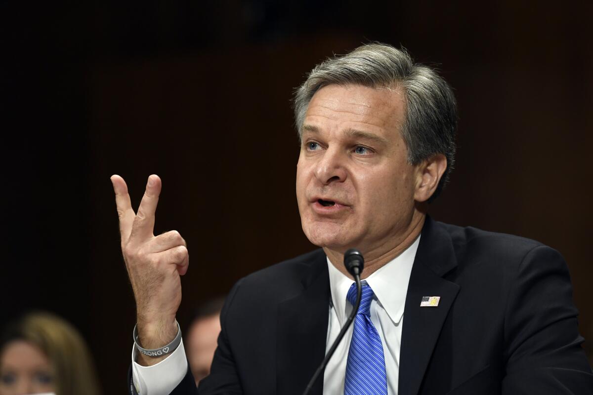 FBI Director Christopher Wray speaks in 2019