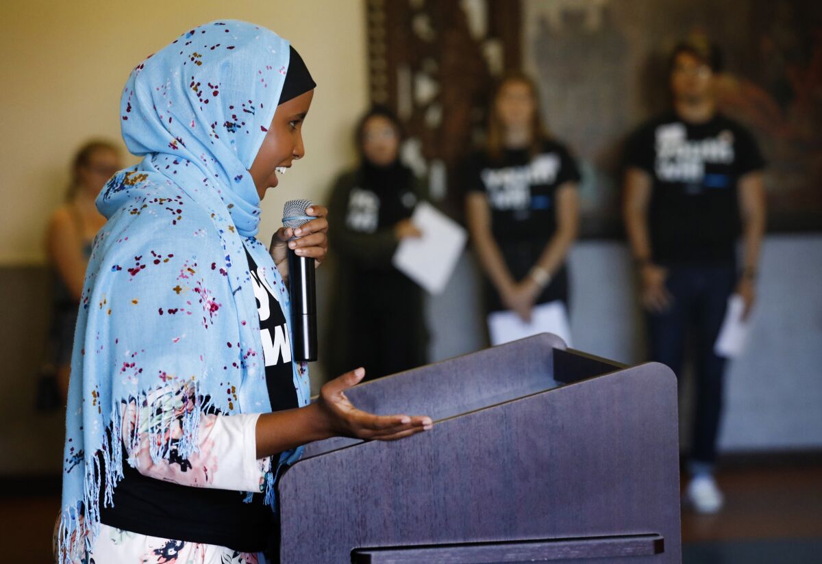 Warsan Artan, an organizer with Youth Will, speaks at a 2019 event to empower young people.  