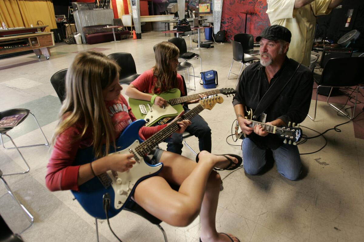 In 2011, the children learned from professional musicians at the Blues Music Summer Camp at the Epicenter.