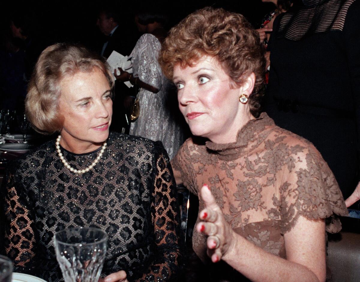 Polly Bergen, right, speaks with U.S. Supreme Court Justice Sandra Day O'Connor at a 1984 National Women's Forum dinner in Washington.