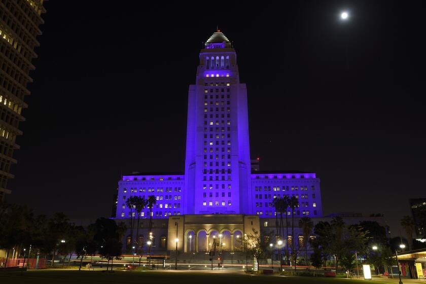 Los Angeles City Hall is lighted in purple on April 23 as a tribute to the late musician Prince.