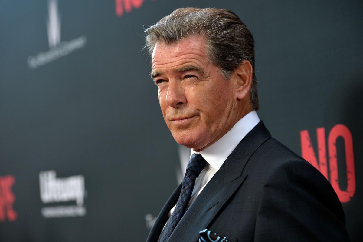 "Some Kind of Beautiful" star Pierce Brosnan seen at the premiere of the Weinstein Company's "No Escape" at Regal Cinemas L.A. Live on August 17, 2015.