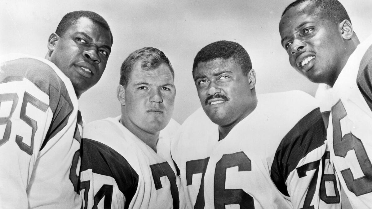 The Rams' "Fearsome Foursome" from left to right are Lamar Lundy, Merlin Olsen, Rosey Grier, and Deacon Jones.