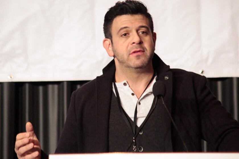 "Find out about those local gems," food man Adam Richman advised visitors to the L.A. Times Travel Show on Sunday.