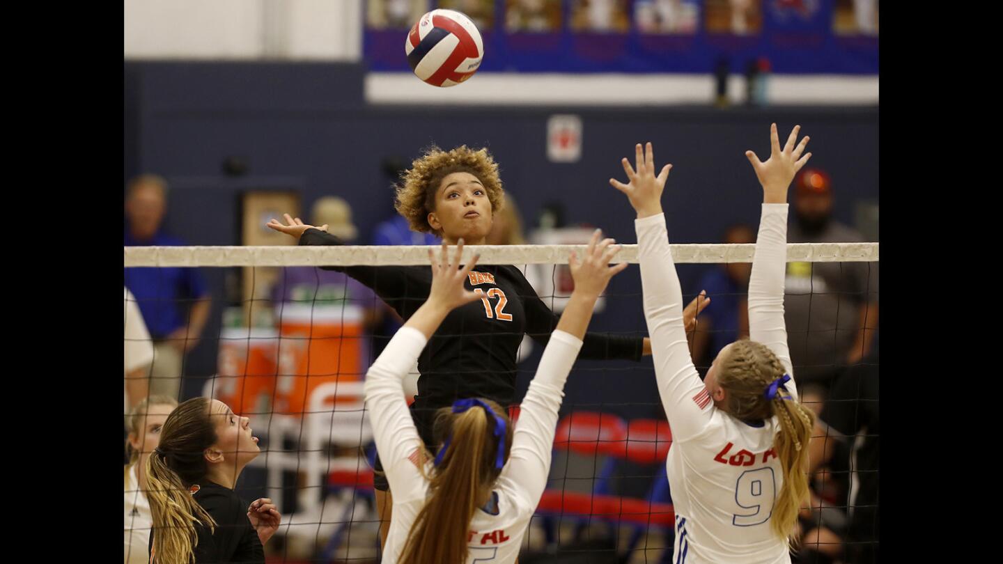 Photo gallery: Huntington Beach vs. Los Alamitos in girls’ volleyball