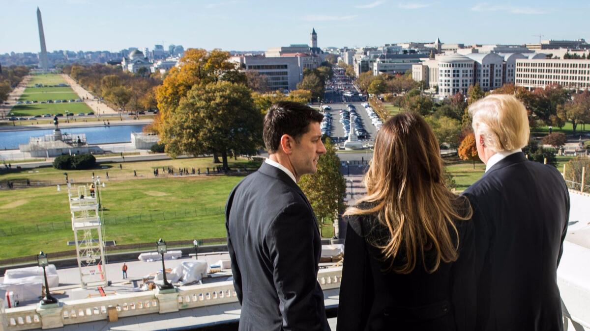 House Speaker Paul Ryan (R-Wis) shows President-elect Donald Trump and his wife, Melania Trump the Speaker's Balcony at the U.S. Capitol on Thursday.