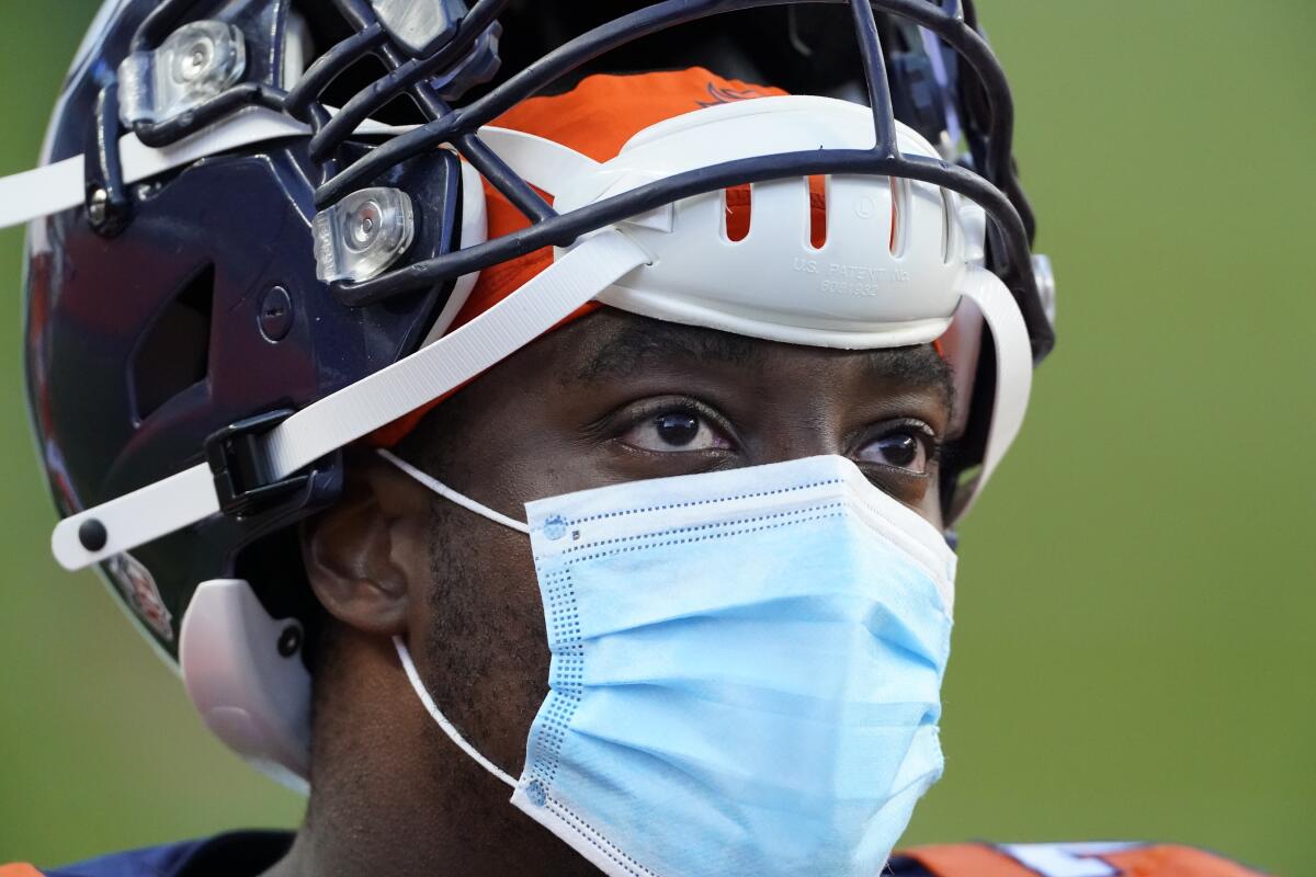 covid mask on football helmet SPIDER BURNS B.A. Masks NFL is working on a