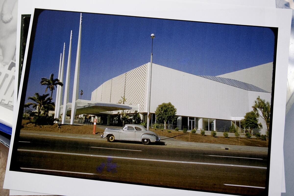The Santa Monica Civic Auditorium, a white building with a line of white flagpoles.
