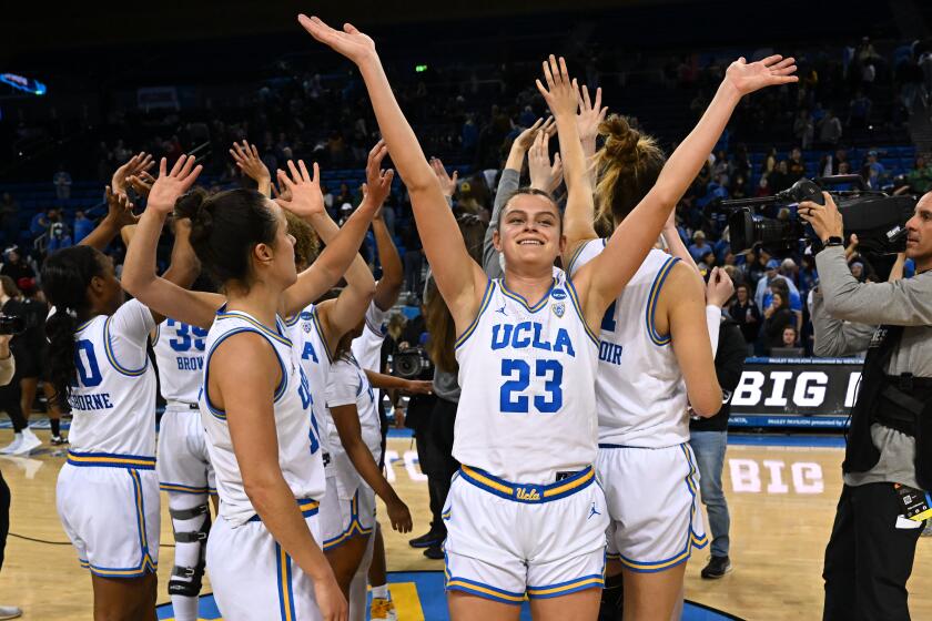 LOS ANGELES, CA - MARCH 18: UCLA Bruins forward Gabriela Jaquez (23) waves to the crowd after a win.