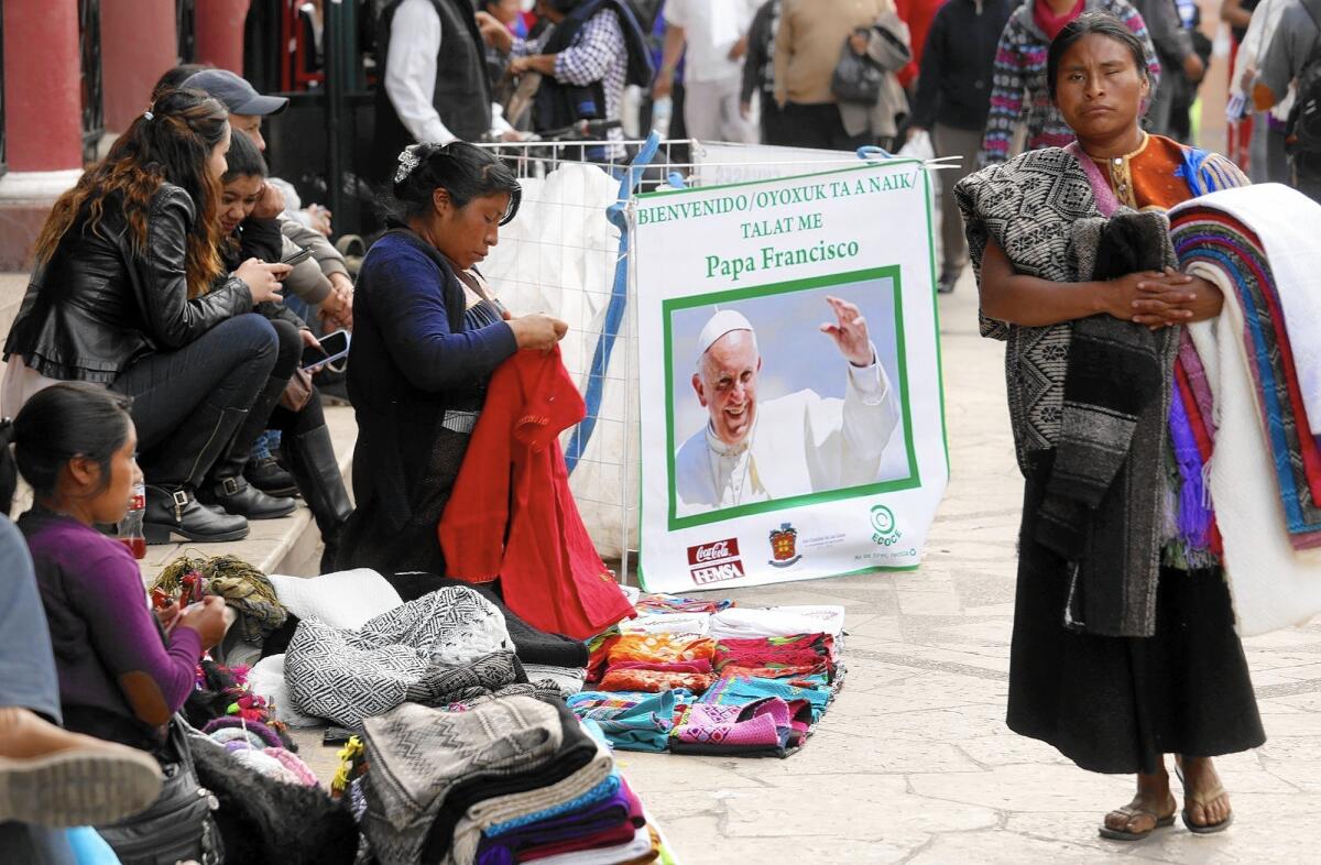 Indigenous women sell their wares in San Cristobal de Las Casas, in Mexico's Chiapas state, where Pope Francis will visit.