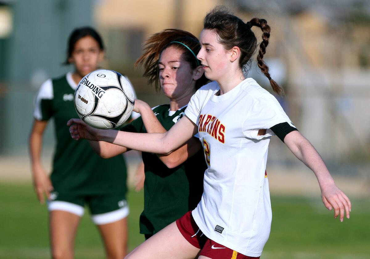 High's Makenna Burnham gets control of the ball during the Rio Hondo League game at Temple City