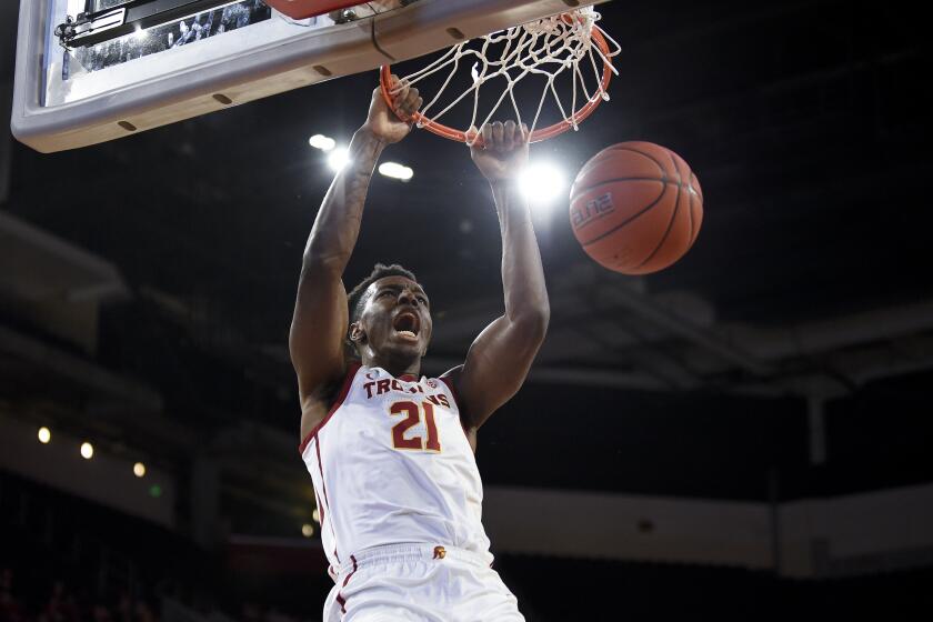 Southern California forward Onyeka Okongwu dunks the ball during the first half of an NCAA college basketball game against Stanford in Los Angeles, Saturday, Jan. 18, 2020. (AP Photo/Kelvin Kuo)