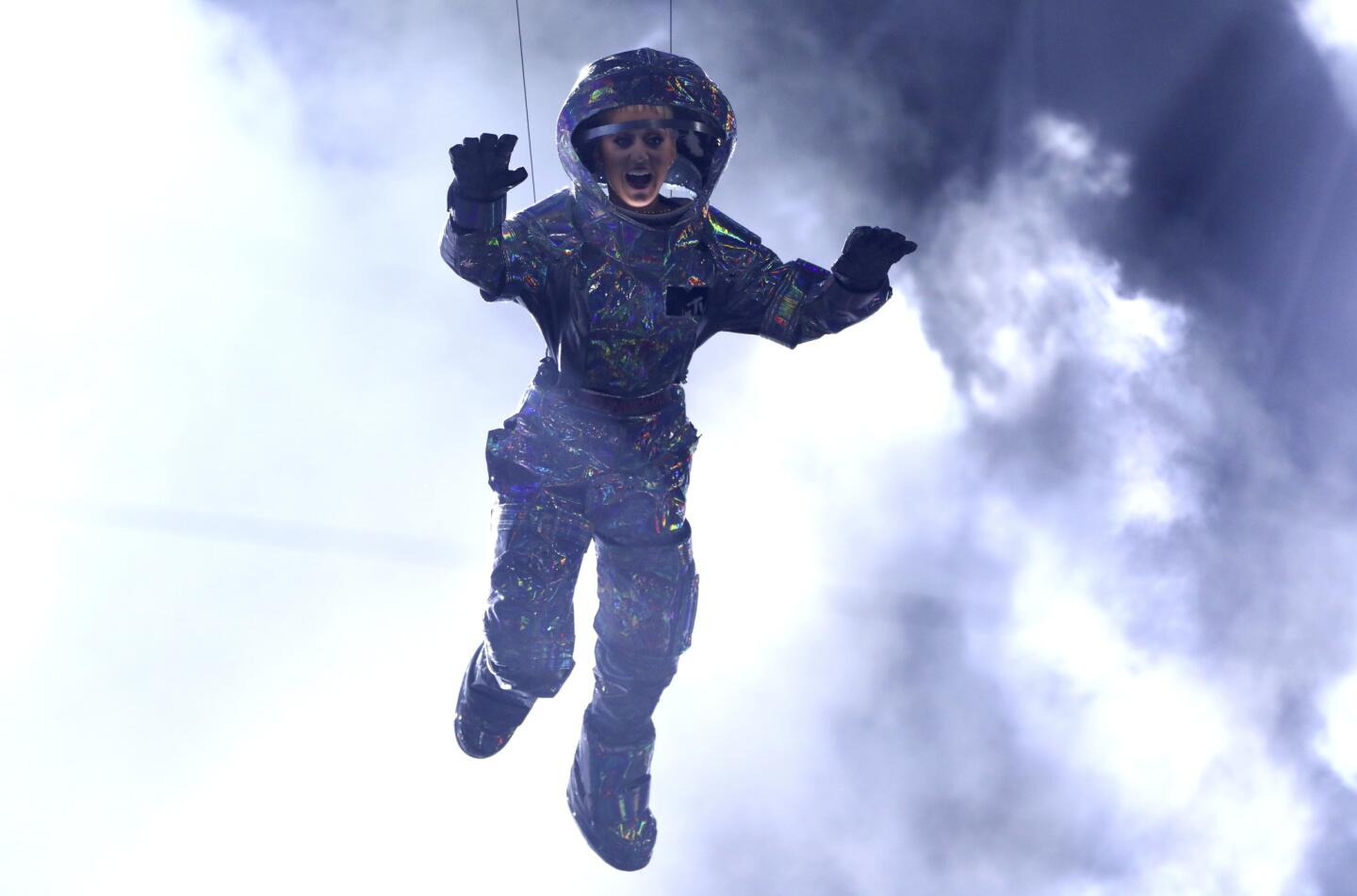 Host Katy Perry is lowered onto the stage at the MTV Video Music Awards at the Forum in Inglewood.