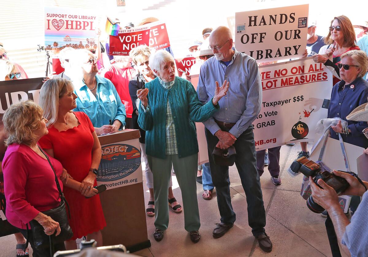 Former Huntington Beach mayors Linda Moulton-Patterson, Jill Hardy, Shirley Dettloff and Vic Leipzig, from left.