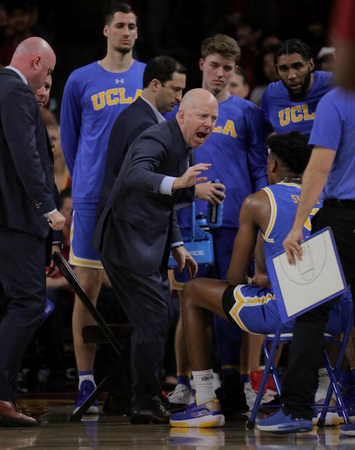 UCLA coach Mick Cronin has words for his players after defensive lapses against USC in the second half at Galen Center on Saturday.