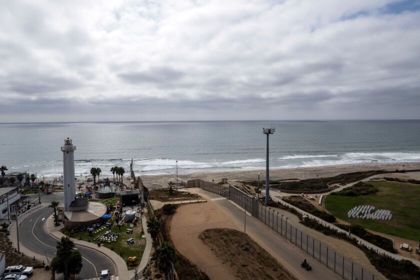 Aerial view of both sides of the Friendship Park during its 51th anniversary celebrations at the border between US and Mexico in Playas de Tijuana, Mexico, on August 20, 2022. - The binational Friendship Park was inaugurated in 1971 by US First Lady Pat Nixon as California's Border Field State Park. (Photo by Guillermo Arias / AFP) (Photo by GUILLERMO ARIAS/AFP via Getty Images)