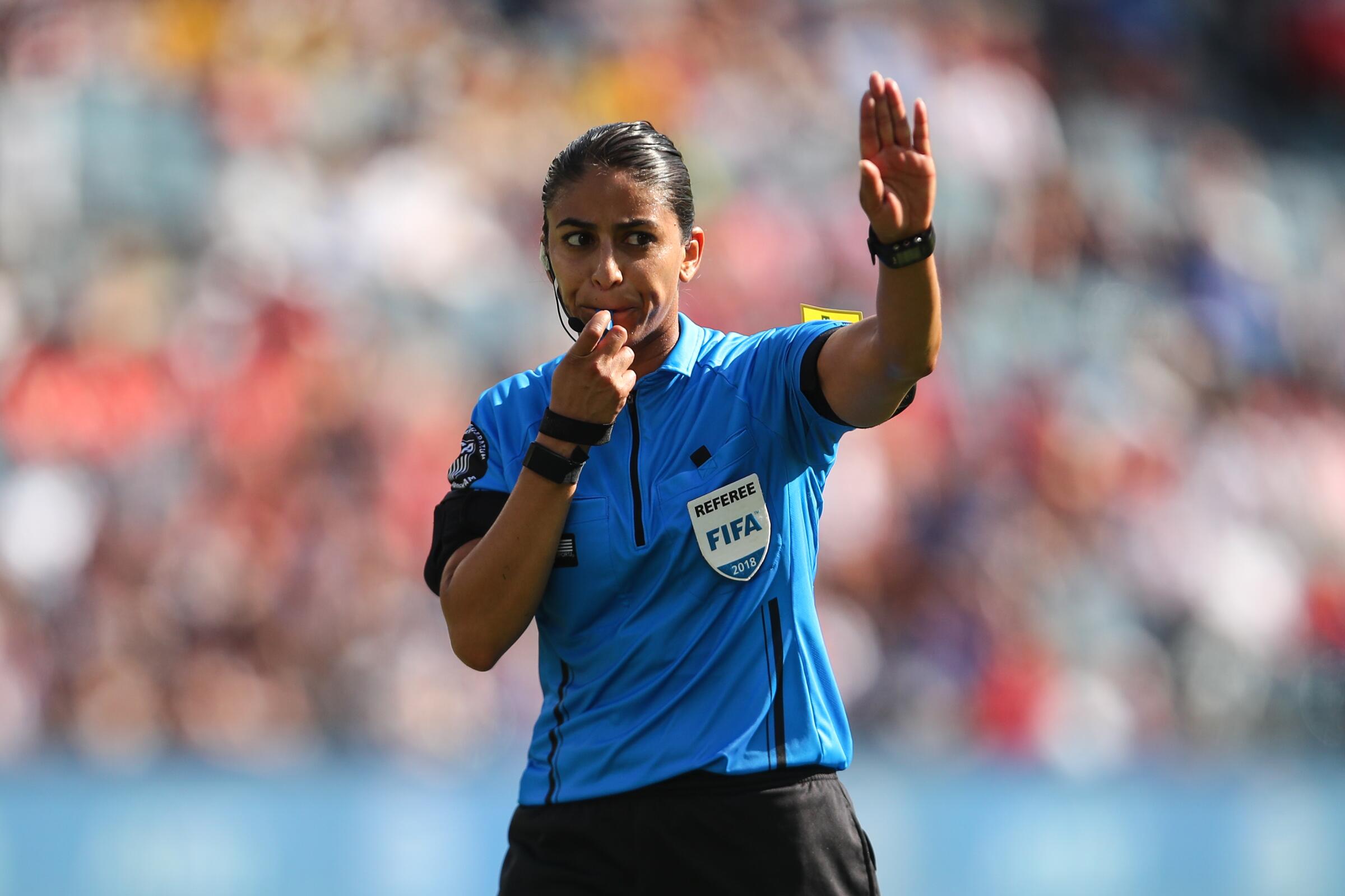 Christina Unkel officiates a women's soccer match between Australia and Brazil during the 2018 Tournament of Nations.