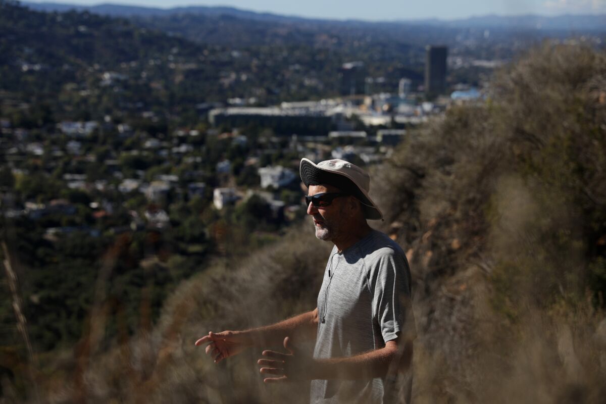 Ray Massara of Burbank chats about election day while hiking in Griffith Park.
