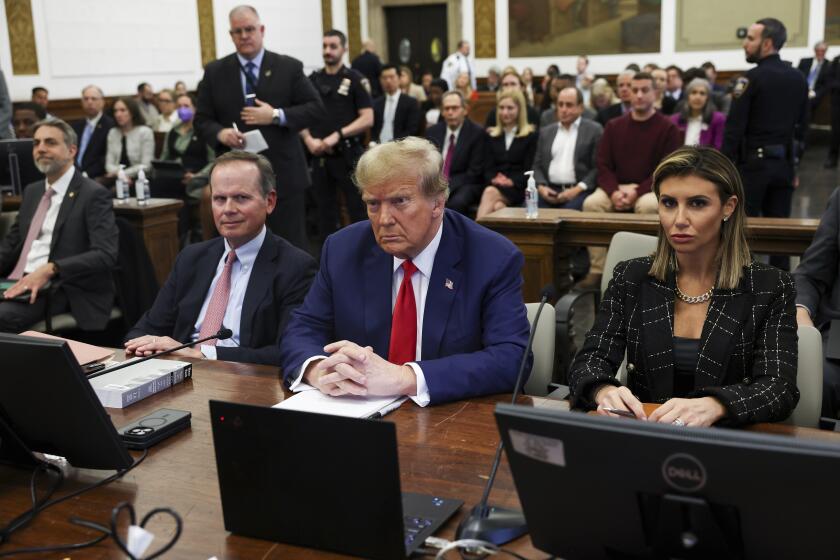 FILE - Former U.S. President Donald Trump, with lawyers Christopher Kise and Alina Habba, attends the closing arguments in the Trump Organization civil fraud trial at New York State Supreme Court in the Manhattan borough of New York, Thursday, Jan. 11, 2024. Within days, Trump could potentially have his sprawling real estate business empire ordered “dissolved” for repeated misrepresentations on financial statements to lenders, adding him to a short list of scam marketers, con artists and others who have been hit with the ultimate punishment for violating New York’s powerful anti-fraud law. (Shannon Stapleton/Pool Photo via AP, File)