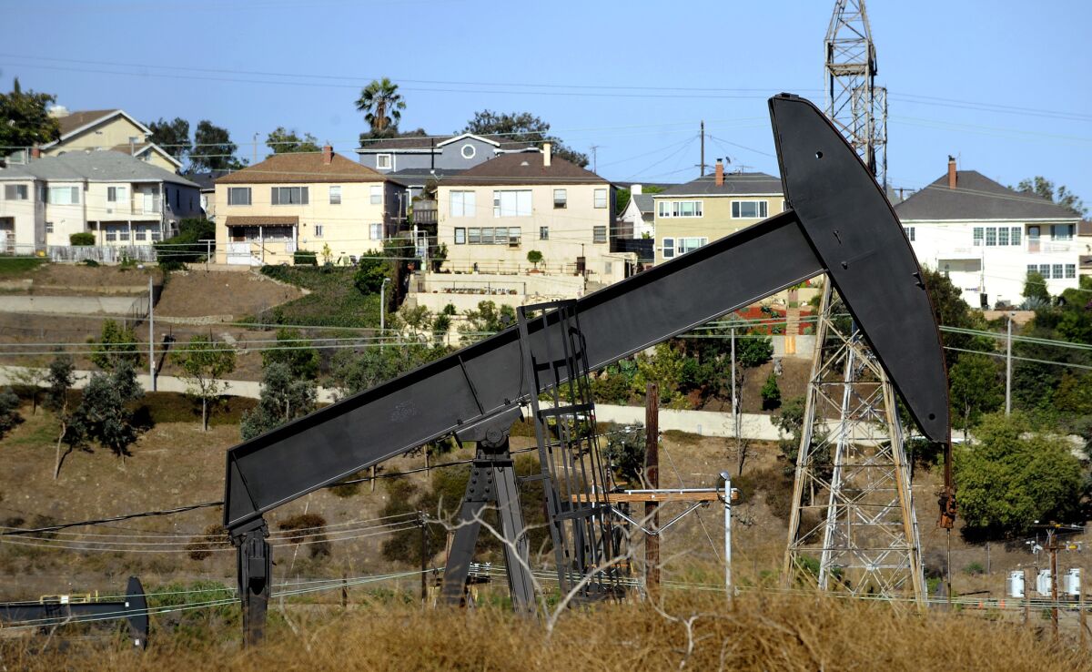 Los Angeles city officials are seeking to restore full-time status to the position of a petroleum administrator amid rising public concern over drilling operations near homes.