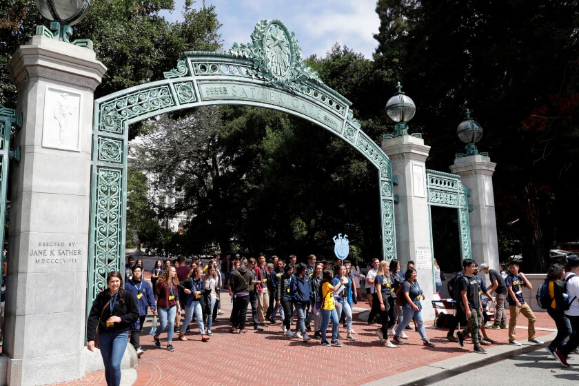 Students walk under Sather Gate at UC Berkeley in 2017. 