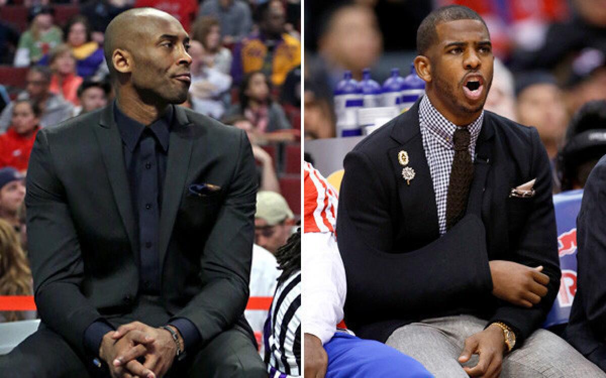 All-Star guards Kobe Bryant, left, of the Lakers and Chris Paul of the Clippers have been fixtures on the bench in street clothes.