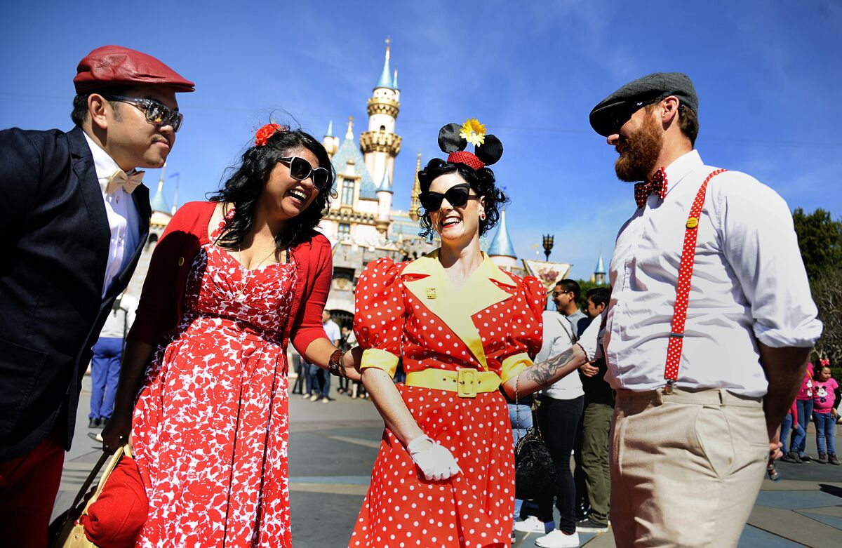 Ferdinand Pujalte, from left, Marianne Decastro, Bre C and Devin Roth hang out at Disneyland during the 2013 Spring Dapper Day.