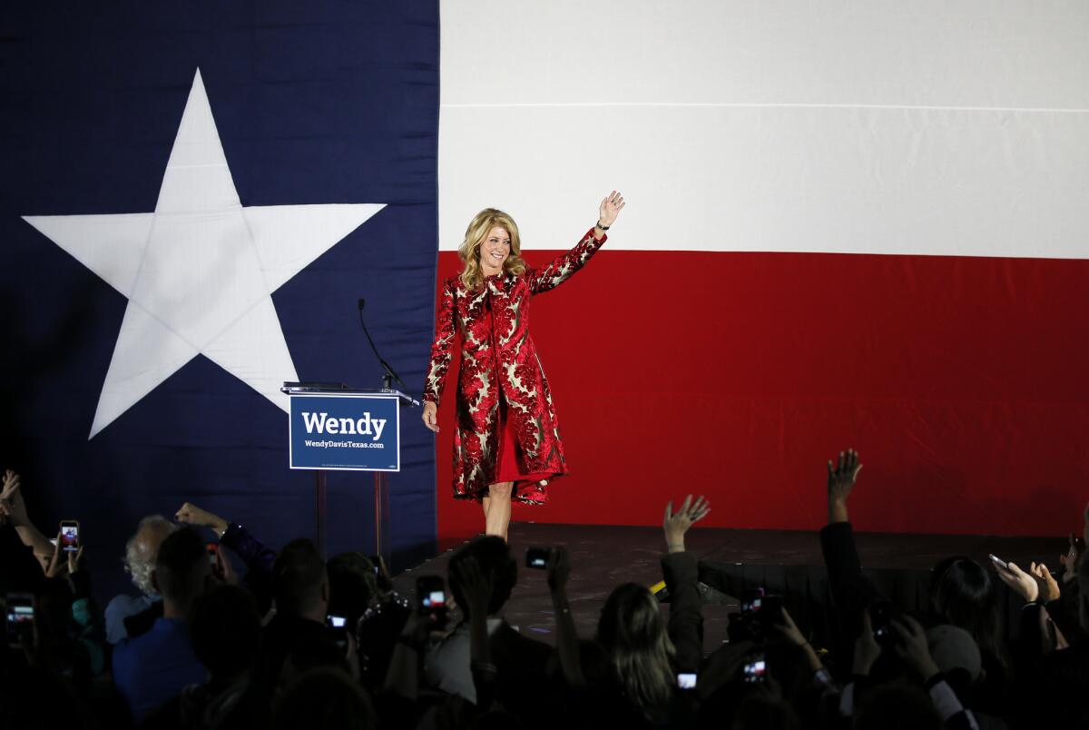 Texas Democratic gubernatorial candidate Wendy Davis waves to supporters after making her concession speech at her election watch party in For Worth, Texas.