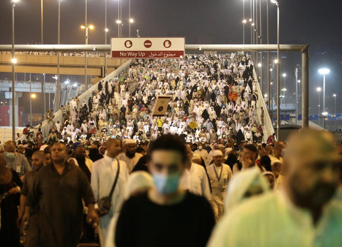 Muslim pilgrims move towards the Jamarat stations to symbolically stone the devil in Mina, Mecca, Saudi Arabia, 25 September 2015.