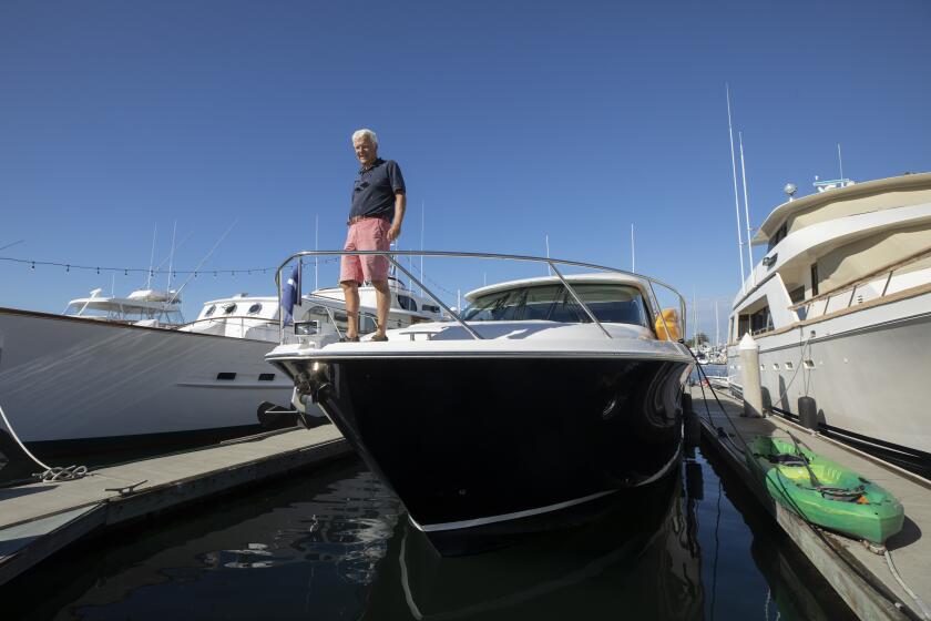 MARINA DEL REY, CA - OCTOBER 05: Bill Wolf will be moving his Tiara 50 yacht from its temporary slip at the California Yacht Club in Marina del Rey to San Pedro where, he says, there are plenty of available slips. Yacht sales have grown the past year and a half and he has heard a few offers for his yacht close to what he paid six years ago. Photographed on Tuesday, Oct. 5, 2021. (Myung J. Chun / Los Angeles Times)