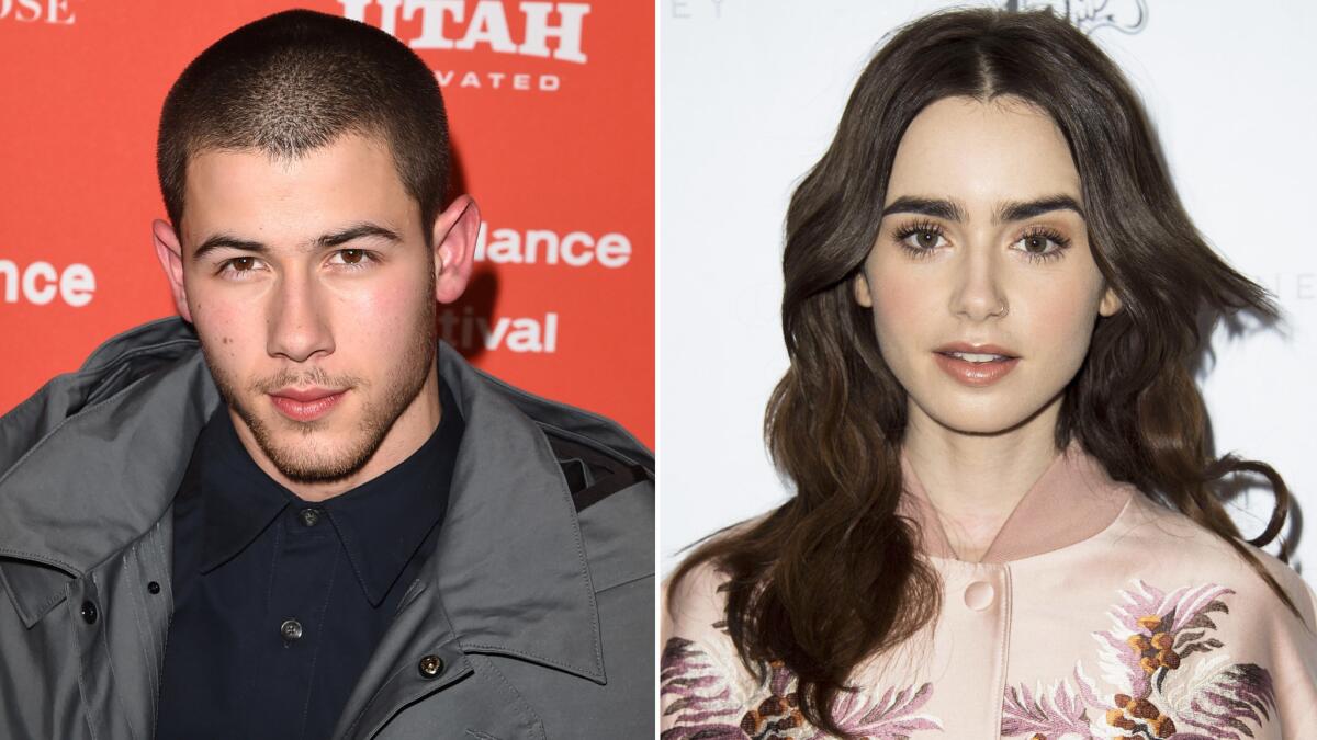 Nick Jonas and Lily Collins are reportedly dating.