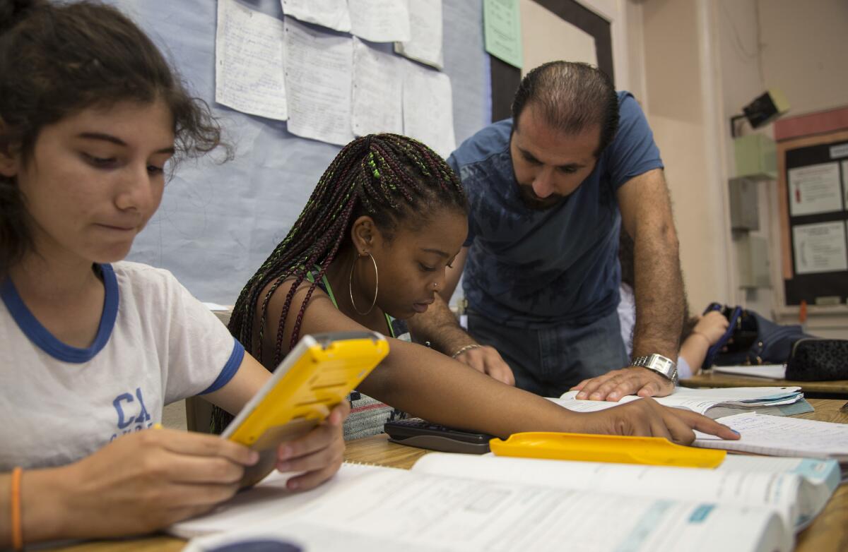 Students at Hollywood High School work on algebra during summer school in July 2016. Gov. Jerry Brown's new state budget will provide more money for some, but not all, schools.