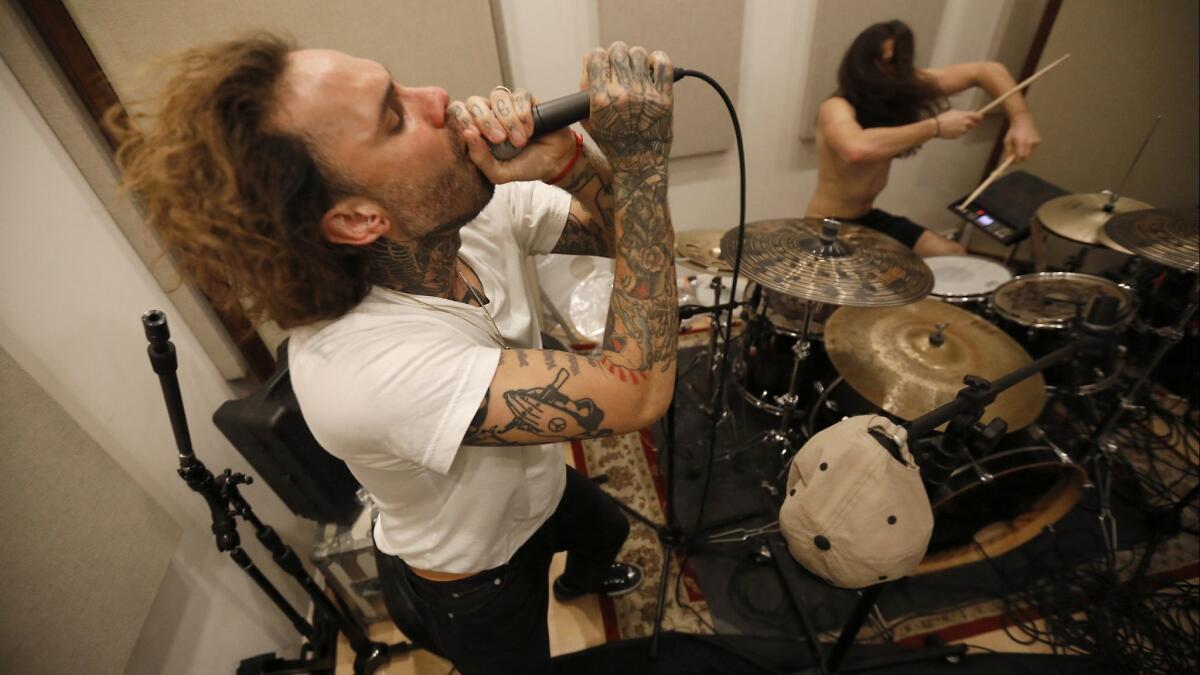 Fever 333 vocalist Jason Aalon Butler and drummer Aric Improta rehearse in Van Nuys.