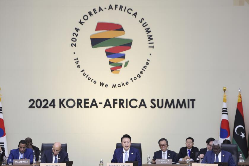 South Korean President Yoon Suk Yeol, center, speaks during the opening ceremony of the 2024 Korea-Africa Summit in South Korea, Tuesday, June 4, 2024. (Hang Kwang-mo/Yonhap via AP)