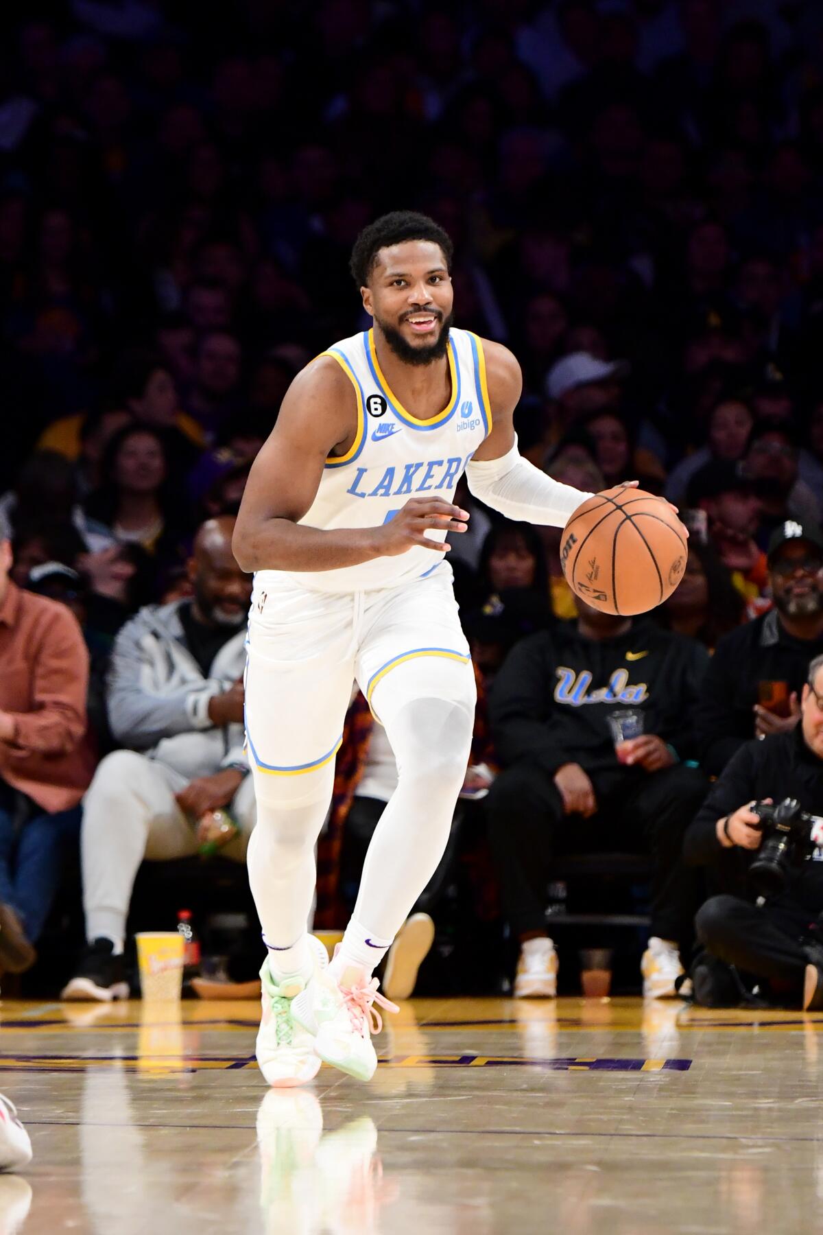Lakers guard Malik Beasley controls the ball on his way to scoring 25 points against the Warriors on Thursday night.