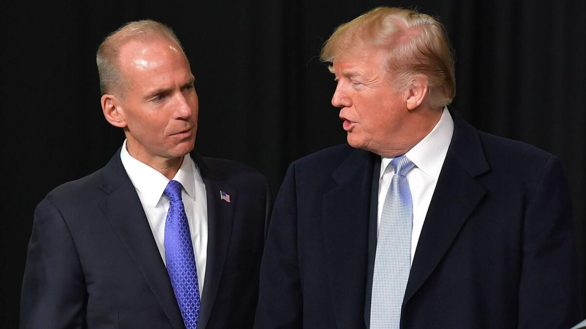 Boeing CEO Dennis A. Muilenburg during a tour of the Boeing plant in St. Louis with President Trump in March 2018.