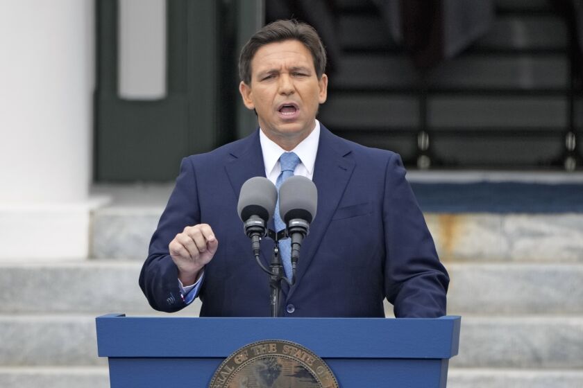 FILE - Florida Gov. Ron DeSantis speaks after being sworn in for his second term during an inauguration ceremony at the Old Capitol, Tuesday, Jan. 3, 2023, in Tallahassee, Fla. Florida lawmakers are meeting to complete a state takeover of Walt Disney World’s self-governing district and expand a migrant relocation program. The GOP-controlled Legislature is returning to Tallahassee on Monday, Feb. 6, 2023 for a special session that is expected to deliver key conservative priorities of Republican Gov. Ron DeSantis ahead of his anticipated White House run in 2024. (AP Photo/Lynne Sladky, File)
