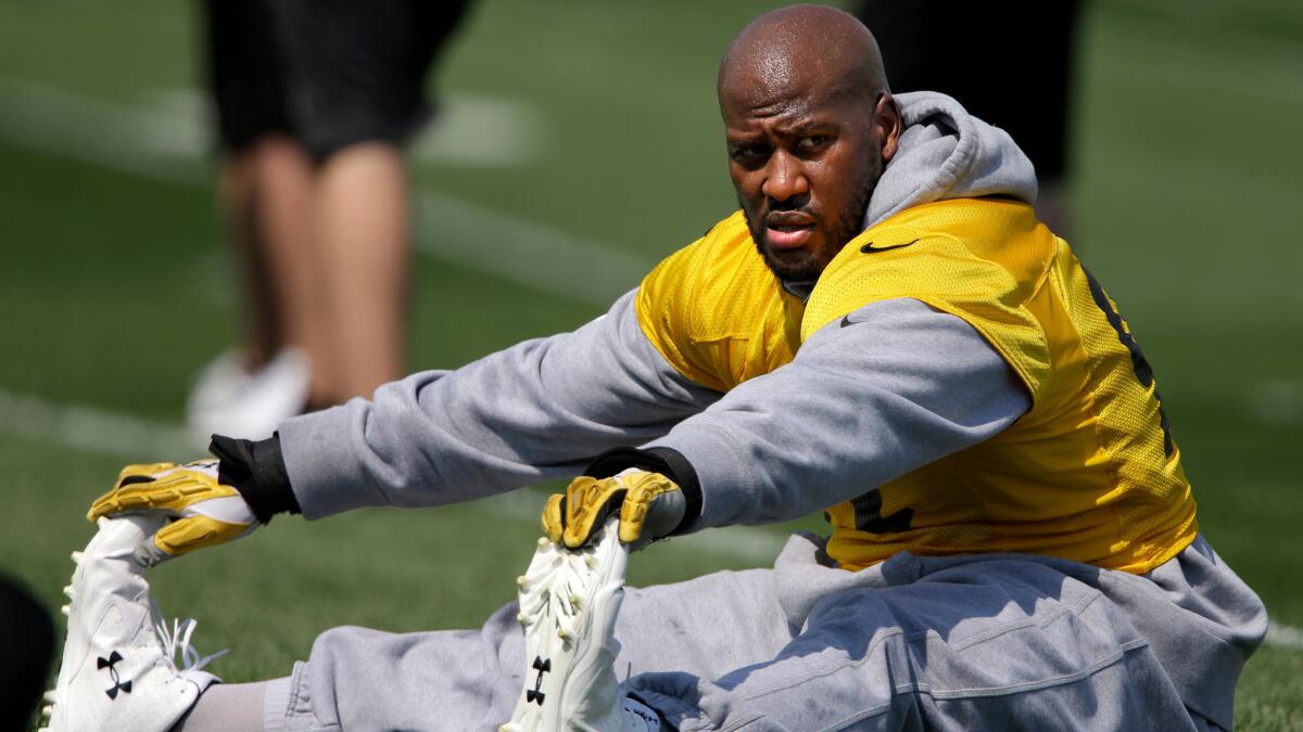 Pittsburgh's James Harrison stretches during practice on July 29.
