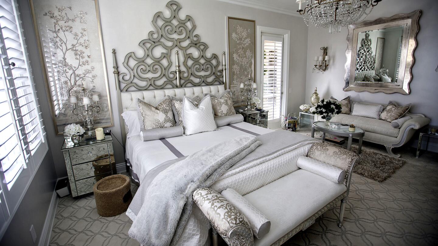 Hollywood Regency glamour in the master bedroom.