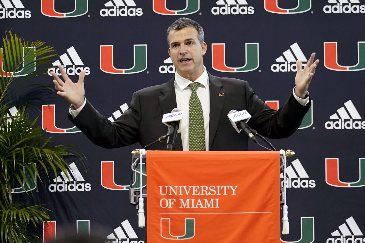 Miami football coach Mario Cristobal speaks at his introductory news conference Tuesday.