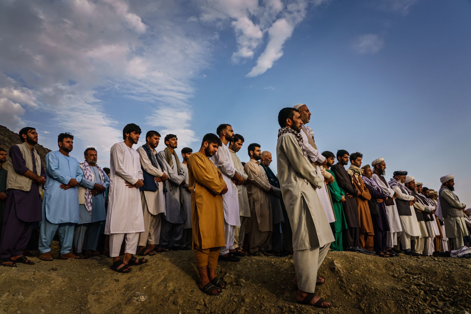 Islamic prayers are recited for the dead before they are buried Monday. 