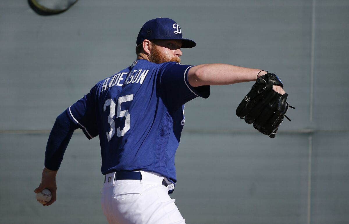 Dodgers southpaw Brett Anderson pitches during a spring training workout on Feb. 22.
