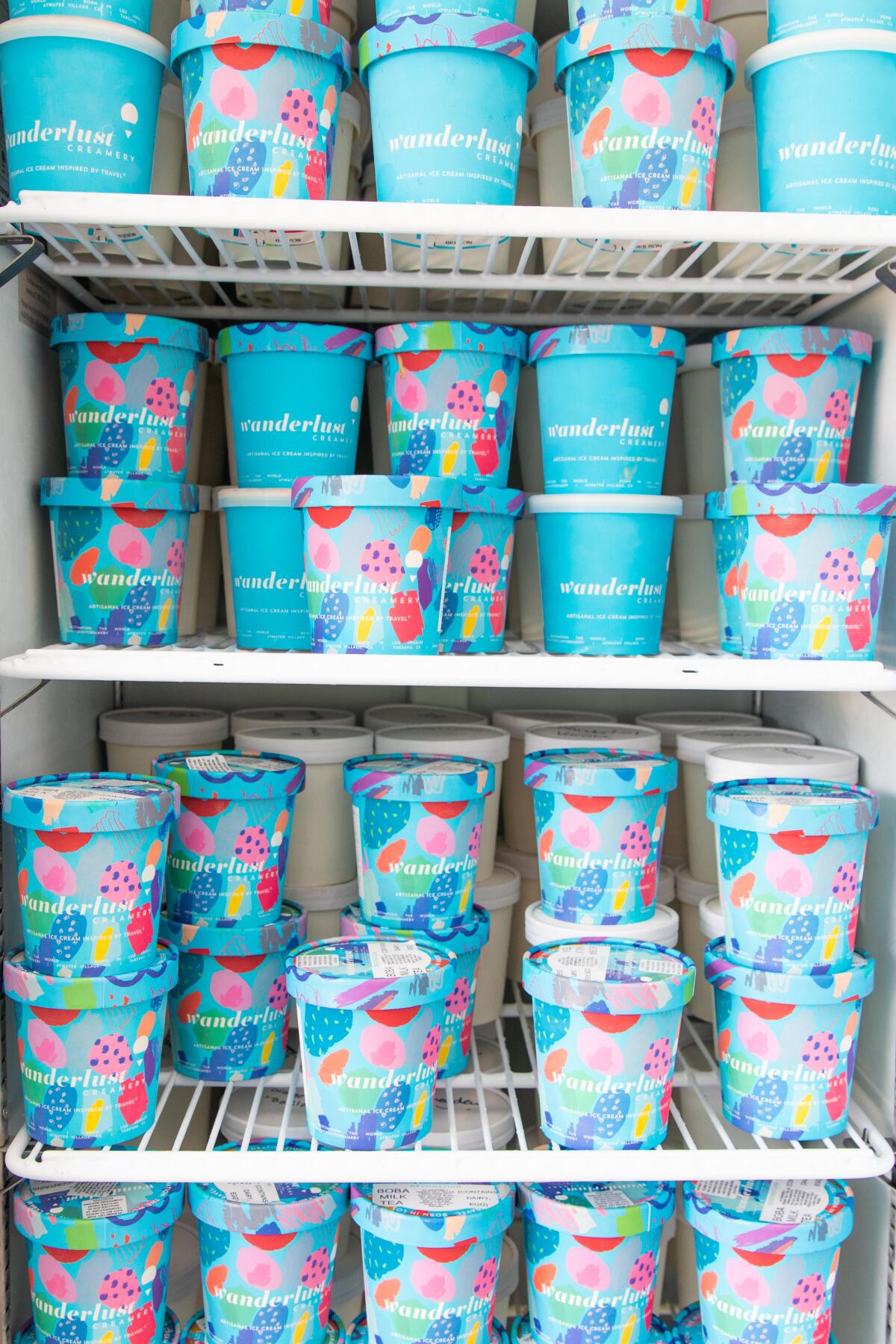 Wanderlust Creamery products inside a refrigerator. 