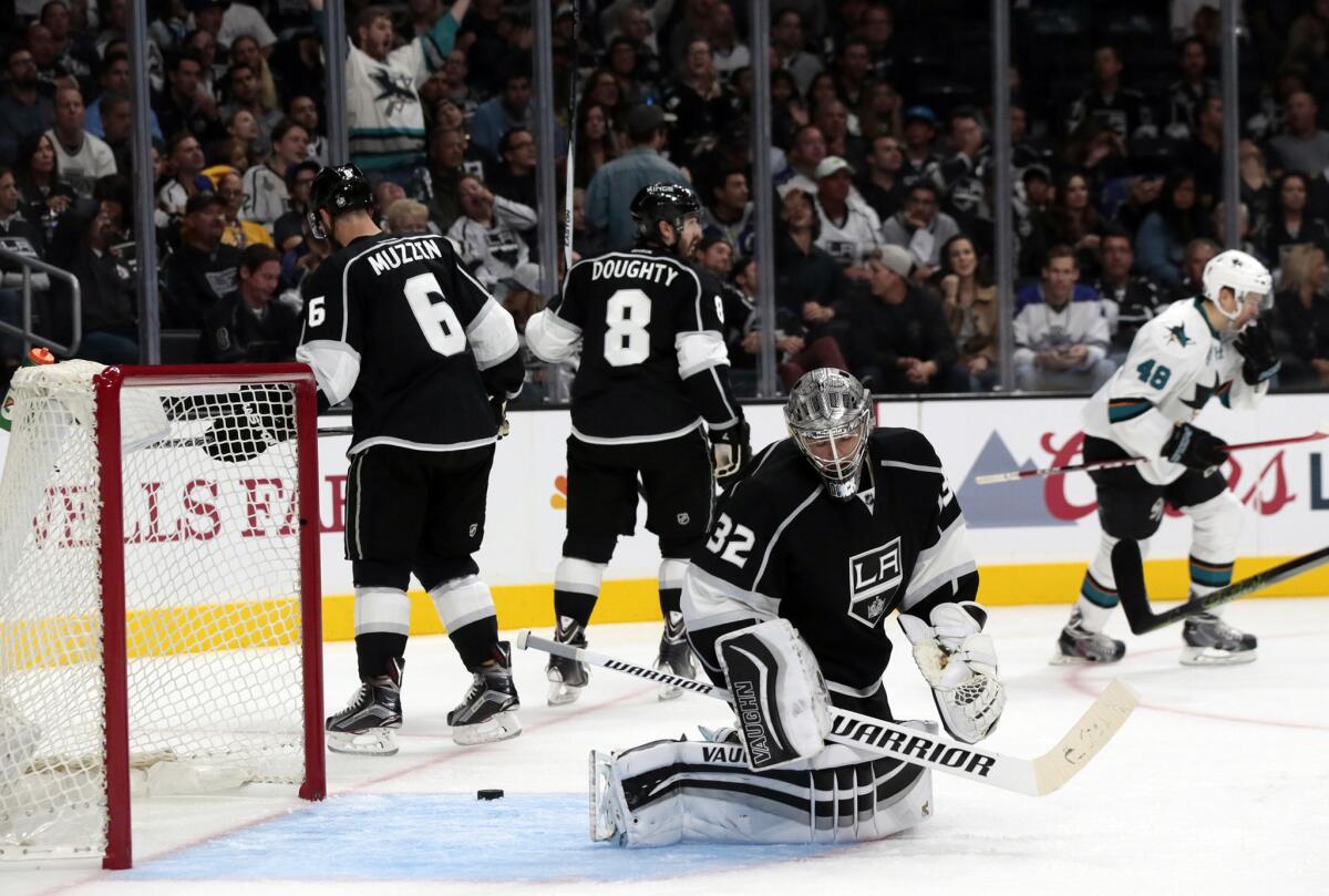 Kings goalie Jonathan Quick slumps after surrendering his second goal in the second period, giving the Sharks a 4-1 lead at Staples Center.