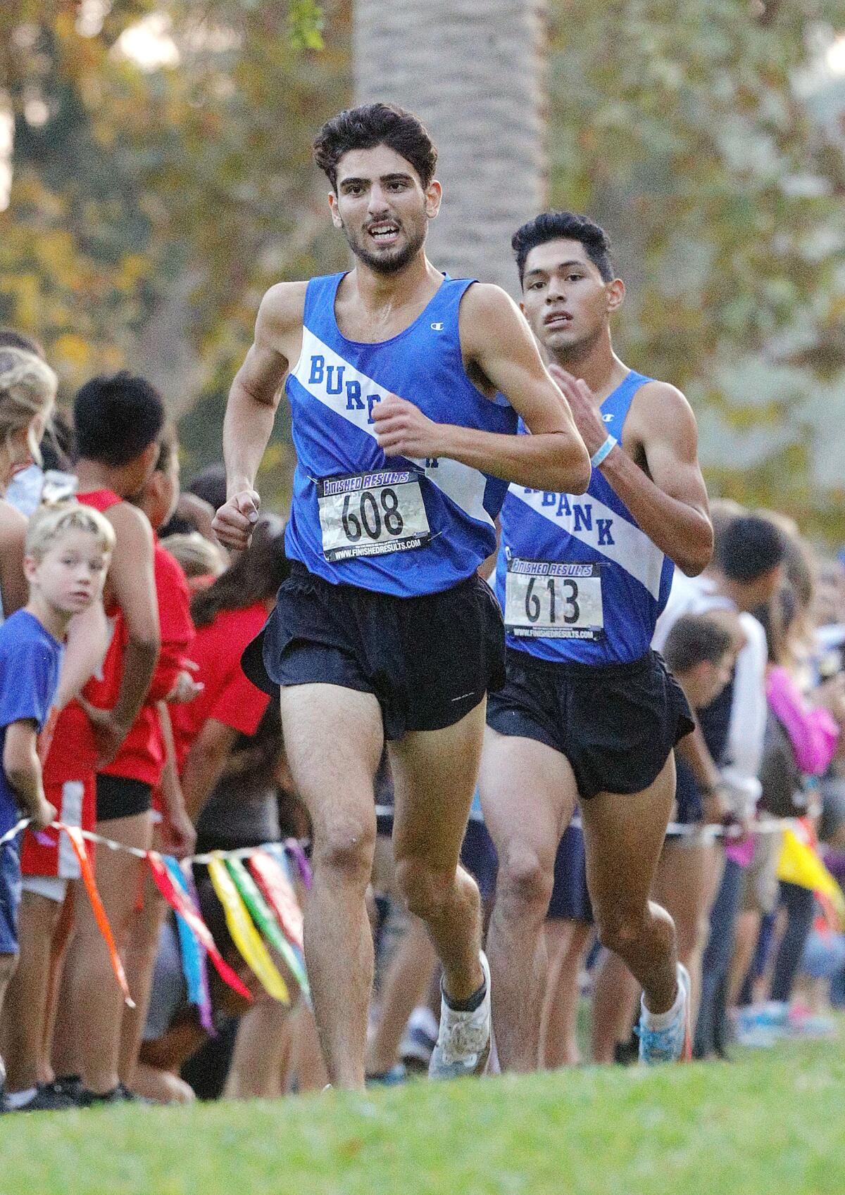 Burbank's Victor Goli comes to the finish in fifth place in a Pacific League cross country meet at Arcadia Park in Arcadia on Thursday, November 7, 2019. This is the final league meet of the season.