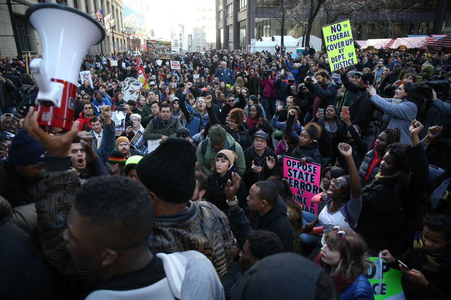 Protesters block traffic at Washington and Clark streets on Dec. 9, 2015, at about the same time Mayor Rahm Emanuel was issuing his apology.