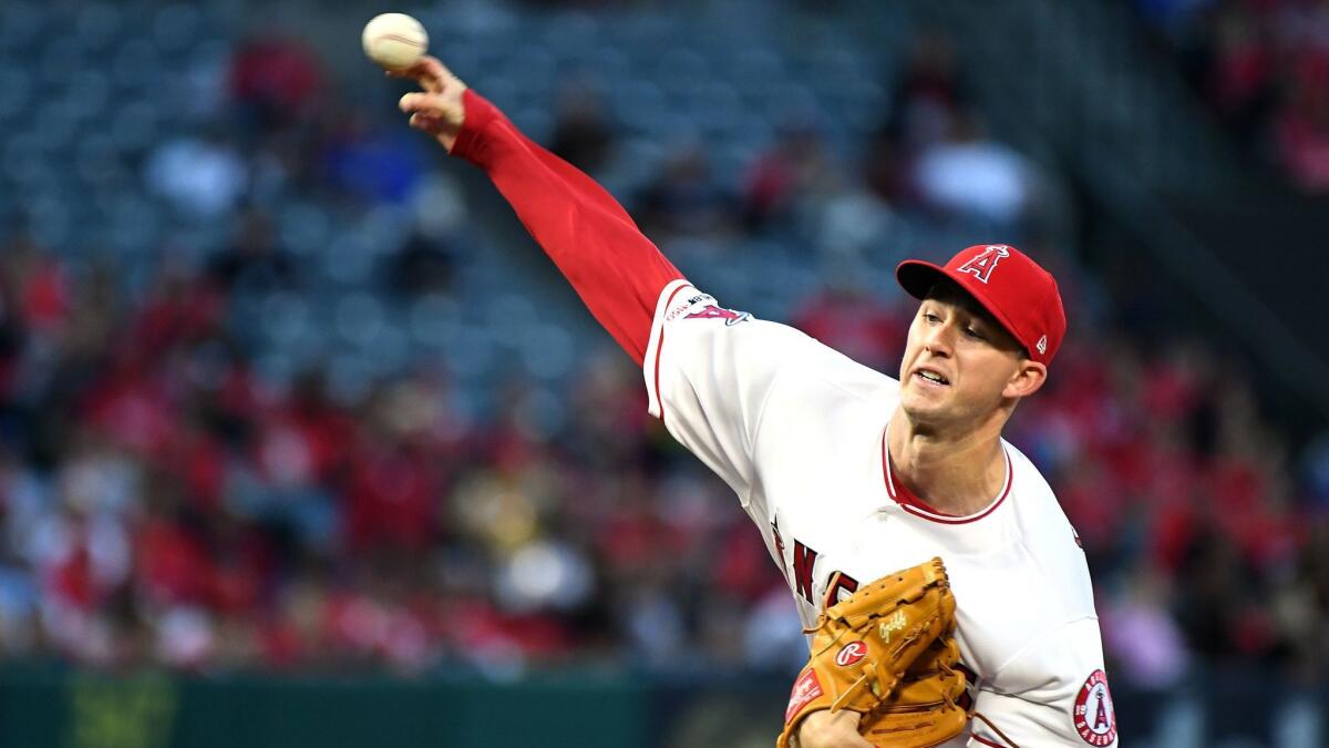 Angels starting pitcher Griffin Canning throws a pitch against the Blue Jays in the first inning at Angel Stadium on Tuesday.