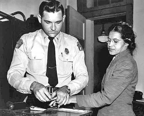 Rosa Parks is shown being fingerprinted by Deputy Sheriff D. H. Lackey in Montgomery, Ala., in this Feb. 22, 1956, photo.