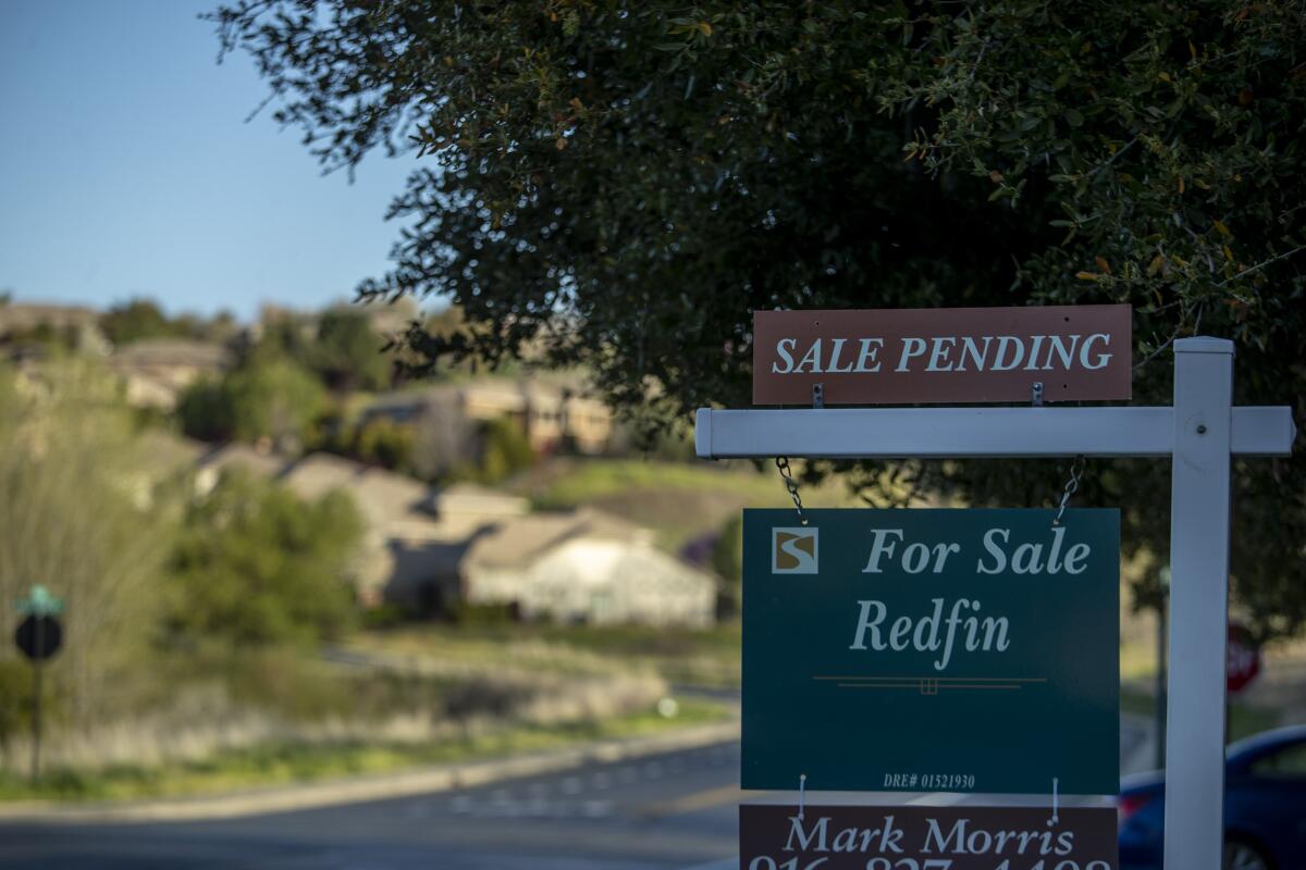 A home in El Dorado Hills, Calif., has a sale-pending sign outside on April 1. 